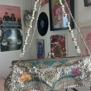 Chic Silver Beaded Clutch with Multicolor Design